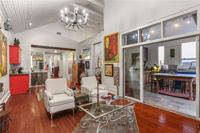 3705 Carondelet St, New Orleans, LA 70115 - living room with high vaulted ceiling, wood finished floors, a chandelier, and wood ceiling