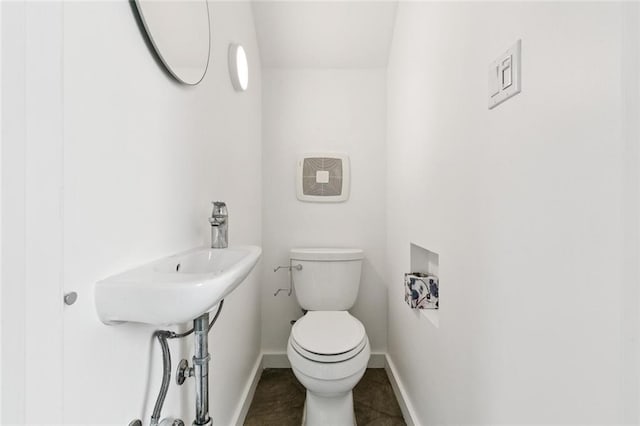 461 Ninth St, New Orleans, LA 70115 - half bathroom with toilet and baseboards