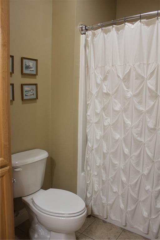 4000 Lake Beau Pre Blvd Unit 131, Baton Rouge, LA 70820 - bathroom with tile patterned floors and shower / bathtub combination with curtain