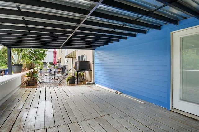 137 N Roadway St Unit 123, New Orleans, LA 70124 - wooden deck with outdoor dining space