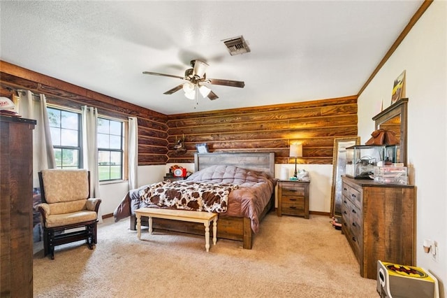 12228 23rd Hwy, Belle Chasse, LA 70037 - bedroom with rustic walls and light colored carpet