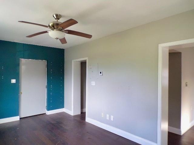 7 Alice Ct, New Orleans, LA 70117 - spare room featuring ceiling fan and wood finished floors
