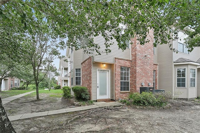 517 Spartan Dr Unit 8103, Slidell, LA 70458 - view of front of house featuring brick siding