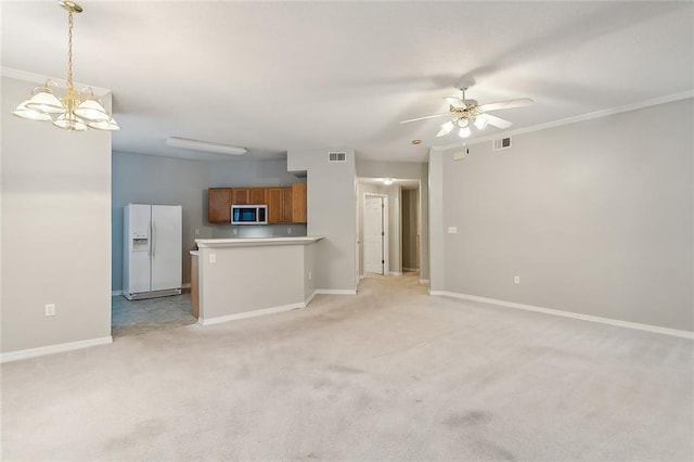 517 Spartan Dr Unit 8103, Slidell, LA 70458 - unfurnished living room with a ceiling fan, light colored carpet, and a chandelier
