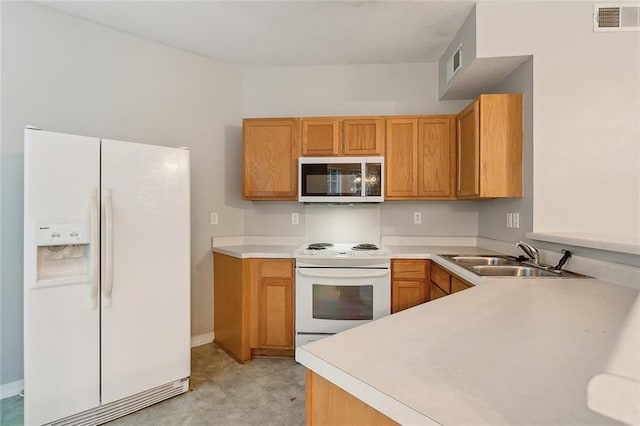 517 Spartan Dr Unit 8103, Slidell, LA 70458 - kitchen featuring white appliances, light countertops, and brown cabinets