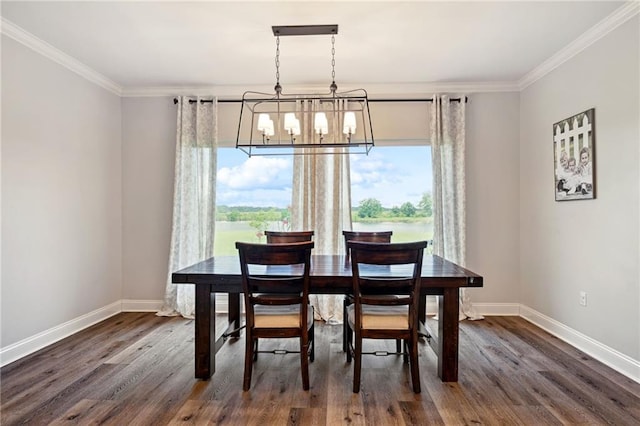 122 Highland Crest Dr, Covington, LA 70435 - dining area with ornamental molding, dark wood-style flooring, and a chandelier