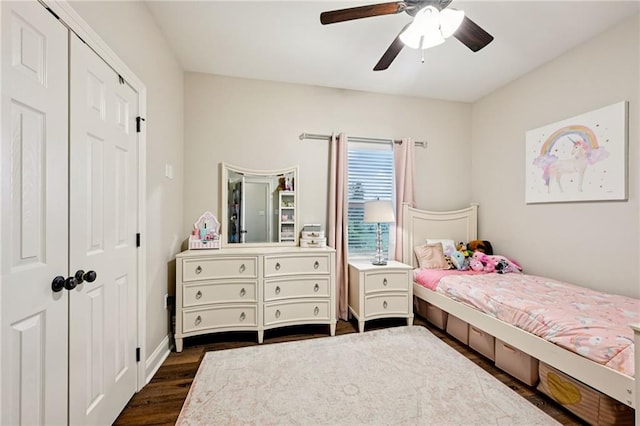 122 Highland Crest Dr, Covington, LA 70435 - bedroom with dark wood-style floors, ceiling fan, and a closet