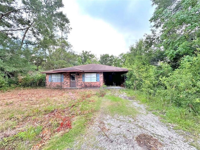 34050 Live Oak Ln, Slidell, LA 70460 - ranch-style house featuring driveway and brick siding