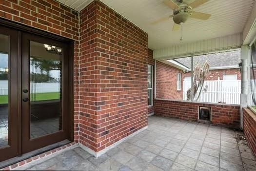 110 Woodchase Dr, Belle Chasse, LA 70037 - unfurnished sunroom featuring french doors and a ceiling fan