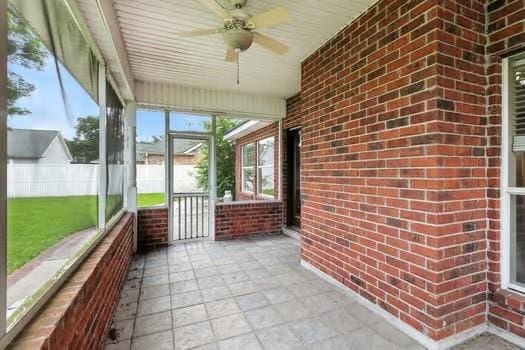 110 Woodchase Dr, Belle Chasse, LA 70037 - unfurnished sunroom with a ceiling fan