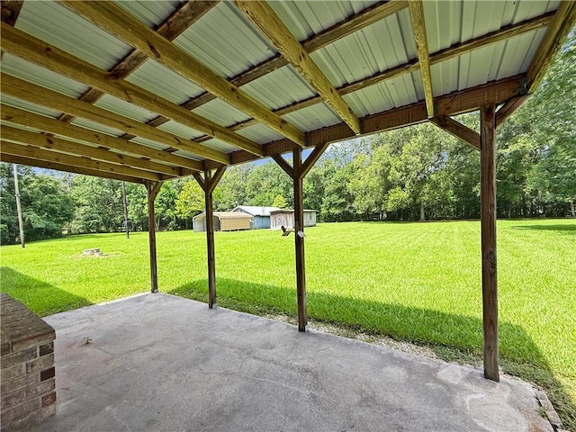 41449 N Charbonnet Rd, Ponchatoula, LA 70454 - view of patio / terrace featuring view of wooded area