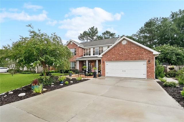 542 Huseman Ln, Covington, LA 70435 - traditional-style home with brick siding, driveway, a front lawn, and an attached garage