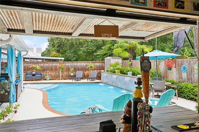 542 Huseman Ln, Covington, LA 70435 - view of swimming pool featuring a fenced backyard, outdoor dining area, and a patio
