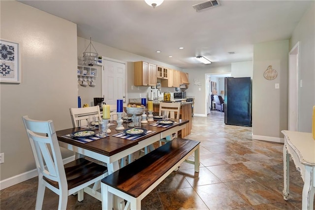 3039 College St, Slidell, LA 70458 - dining space with recessed lighting and light tile patterned floors