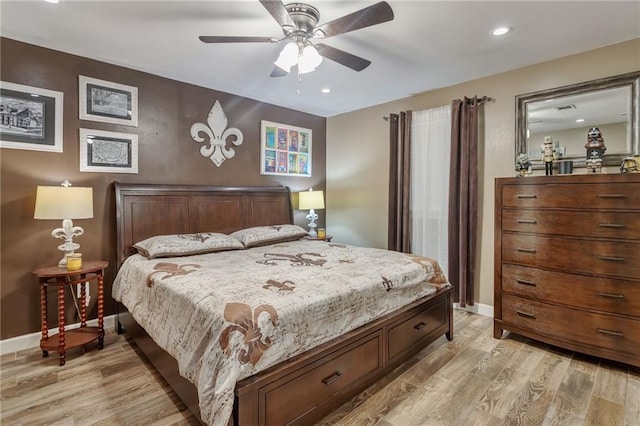 3039 College St, Slidell, LA 70458 - bedroom featuring light wood-style flooring, recessed lighting, and a ceiling fan