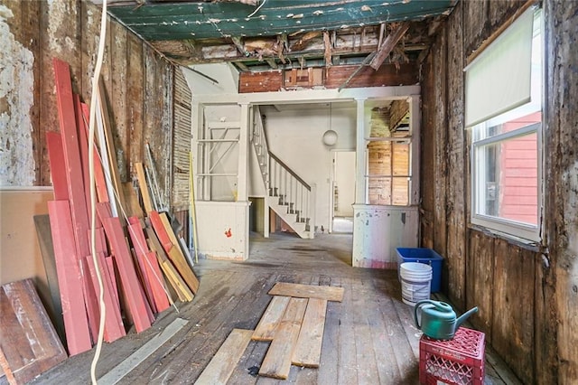 711 Montegut St, New Orleans, LA 70117 - miscellaneous room with stairs and wood-type flooring