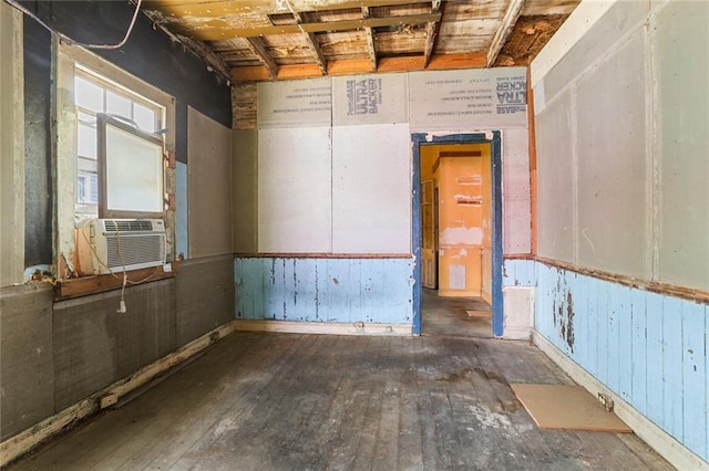 711 Montegut St, New Orleans, LA 70117 - spare room featuring hardwood / wood-style floors and cooling unit