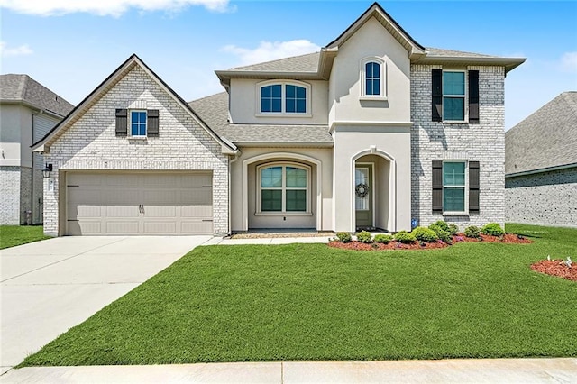 5681 Oakworth St, Slidell, LA 70461 - view of front facade featuring concrete driveway, a front lawn, stucco siding, and a shingled roof