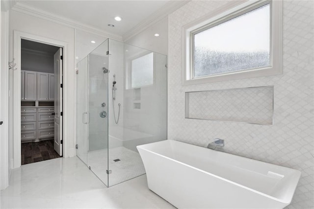 130 Bald Eagle Dr, Belle Chasse, LA 70037 - full bath featuring ornamental molding, a shower stall, a freestanding tub, and recessed lighting