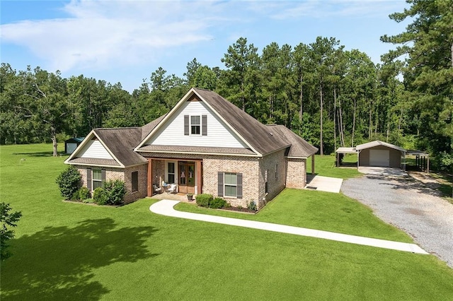 53131 S Bennett Rd, Independence, LA 70443 - view of front of property featuring a carport, a porch, a front lawn, gravel driveway, and brick siding