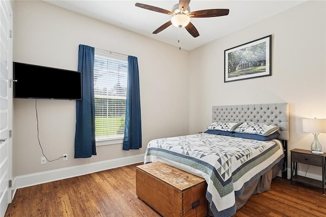 53131 S Bennett Rd, Independence, LA 70443 - bedroom featuring wood finished floors, multiple windows, and a ceiling fan