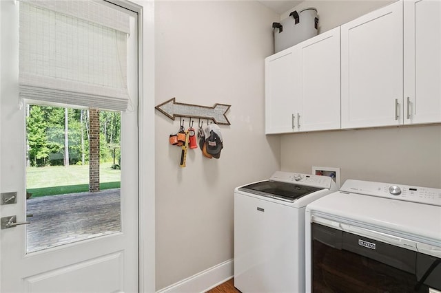 53131 S Bennett Rd, Independence, LA 70443 - laundry area with cabinet space and separate washer and dryer