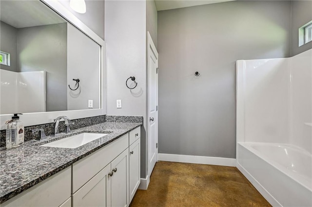 22101 Fletcher Rd, Ponchatoula, LA 70454 - bathroom featuring concrete floors, vanity, and  shower combination