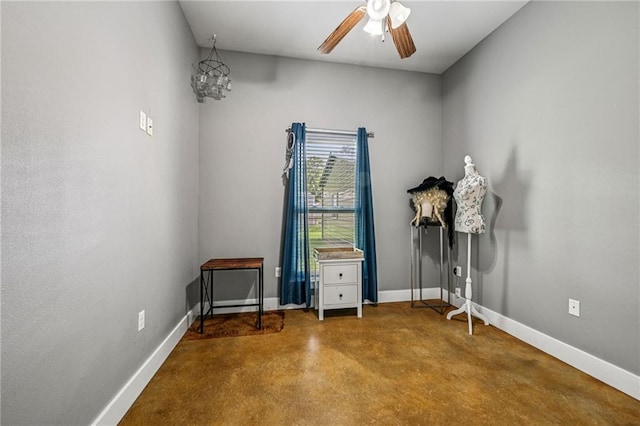 22101 Fletcher Rd, Ponchatoula, LA 70454 - misc room with concrete floors, a ceiling fan, and a chandelier