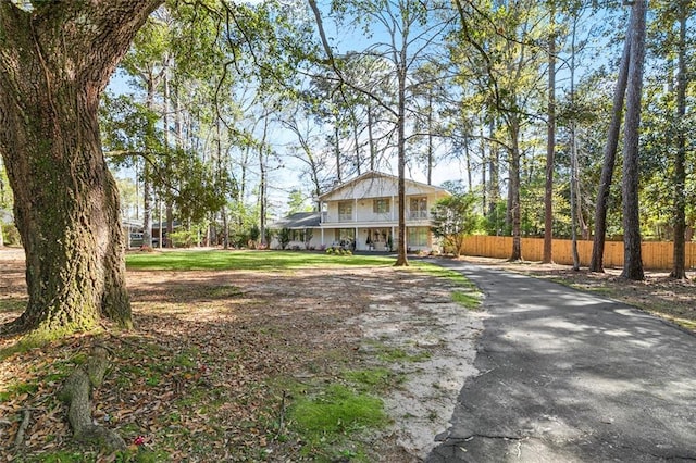 163 Tchefuncte Dr, Covington, LA 70433 - view of front of house with driveway and a porch