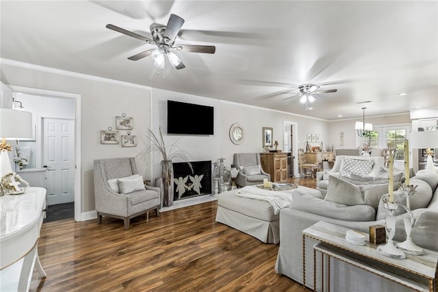 163 Tchefuncte Dr, Covington, LA 70433 - living area featuring ceiling fan, dark wood finished floors, and crown molding