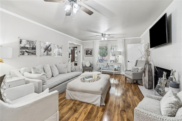 163 Tchefuncte Dr, Covington, LA 70433 - living room featuring a ceiling fan, wood finished floors, and crown molding