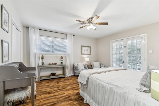 163 Tchefuncte Dr, Covington, LA 70433 - bedroom featuring multiple windows, wood finished floors, ceiling fan, and access to exterior