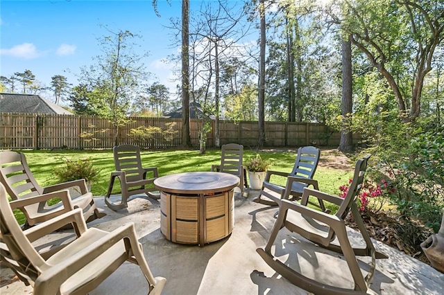 163 Tchefuncte Dr, Covington, LA 70433 - fenced backyard featuring an outdoor fire pit and a patio area