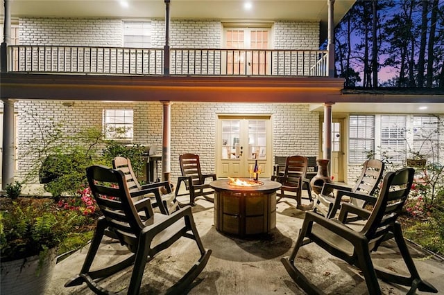 163 Tchefuncte Dr, Covington, LA 70433 - patio / terrace with an outdoor fire pit, a patio, and french doors