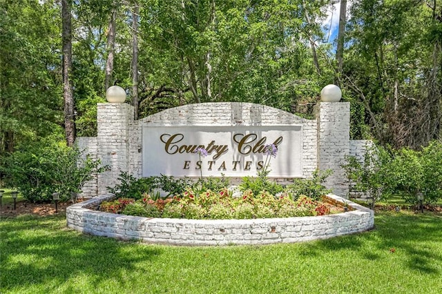 163 Tchefuncte Dr, Covington, LA 70433 - community sign with a lawn