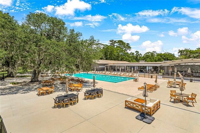 163 Tchefuncte Dr, Covington, LA 70433 - community pool featuring a patio
