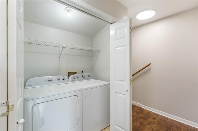 643 Stoney Creek Ave, Baton Rouge, LA 70808 - laundry area featuring washing machine and dryer and wood finished floors