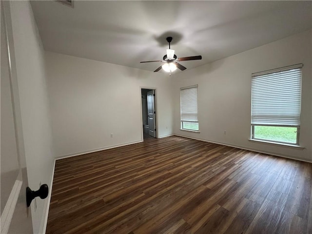 500 Buckthorne Pl, Covington, LA 70435 - empty room with dark wood-style flooring and ceiling fan