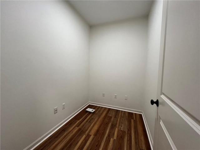 500 Buckthorne Pl, Covington, LA 70435 - unfurnished room with dark wood-style flooring and baseboards