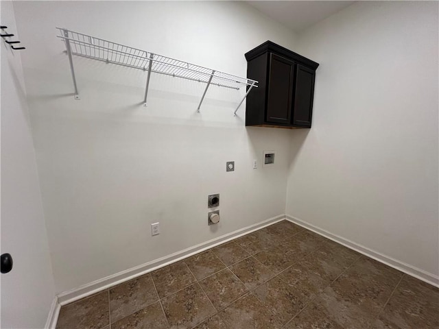 500 Buckthorne Pl, Covington, LA 70435 - laundry area with cabinet space, hookup for a washing machine, hookup for an electric dryer, and dark stone finish floors
