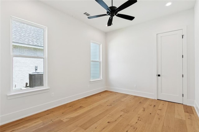 4233 Cypress Point Dr, Covington, LA 70433 - spare room featuring healthy amount of natural light, light wood-type flooring, a ceiling fan, and recessed lighting