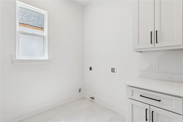 4233 Cypress Point Dr, Covington, LA 70433 - laundry area featuring hookup for an electric dryer, hookup for a washing machine, and cabinet space