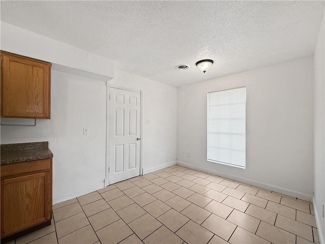 1024 Marshall Dr, Marrero, LA 70072 - unfurnished room with a textured ceiling and baseboards