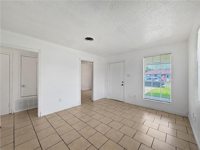 1024 Marshall Dr, Marrero, LA 70072 - spare room featuring a textured ceiling