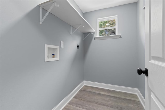 162628 Numa St, New Orleans, LA 70114 - laundry room with washer hookup, wood finished floors, and hookup for an electric dryer