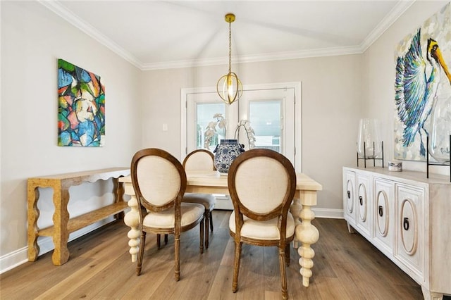 143 Vans Ln, Destrehan, LA 70047 - dining room with wood finished floors and crown molding