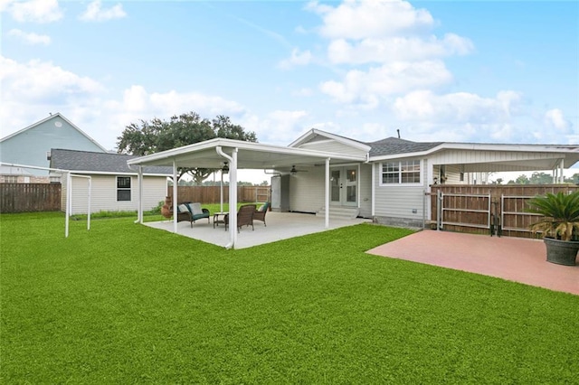 143 Vans Ln, Destrehan, LA 70047 - back of house with a fenced backyard, a ceiling fan, and a patio area