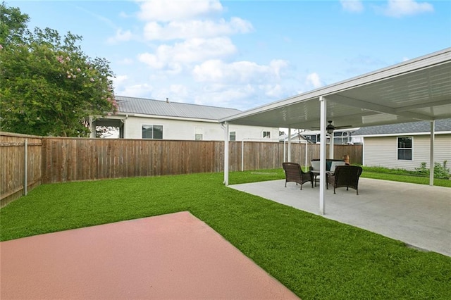 143 Vans Ln, Destrehan, LA 70047 - fenced backyard with a patio area