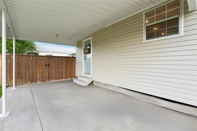 143 Vans Ln, Destrehan, LA 70047 - view of patio featuring a carport and entry steps