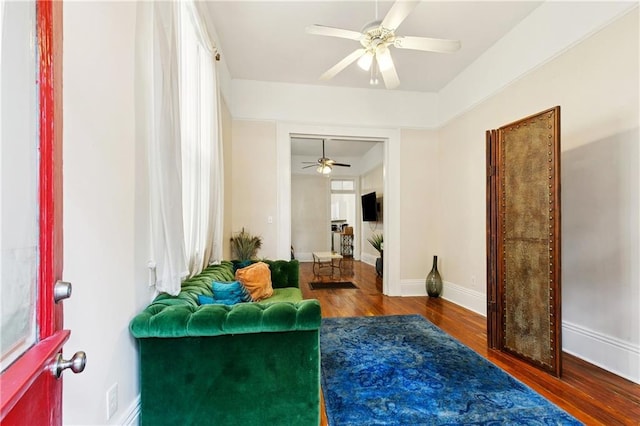 332426 Banks St, New Orleans, LA 70119 - living area with a ceiling fan, wood finished floors, and plenty of natural light